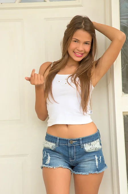 Joyful Latina Kiara Lorens displays her sweet assets outdoors