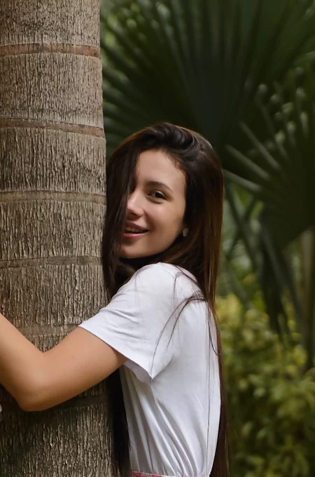 Leggy Paloma wears sexy sneakers while hugging trees